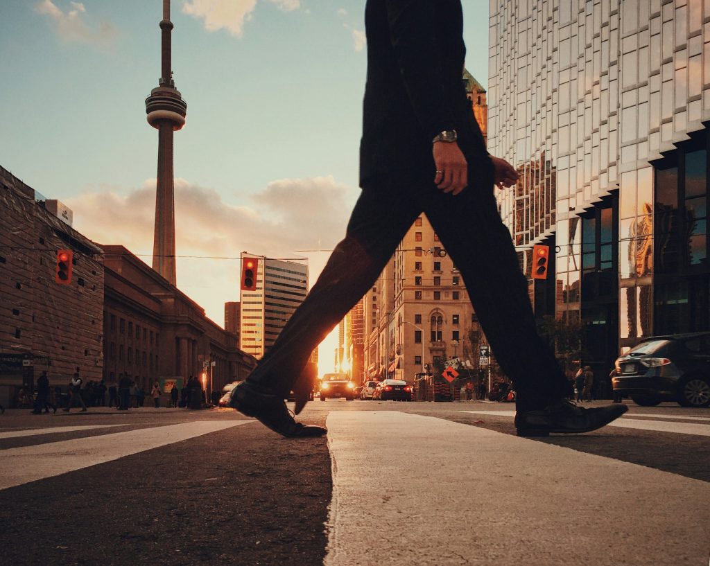 man walking on crosswalk